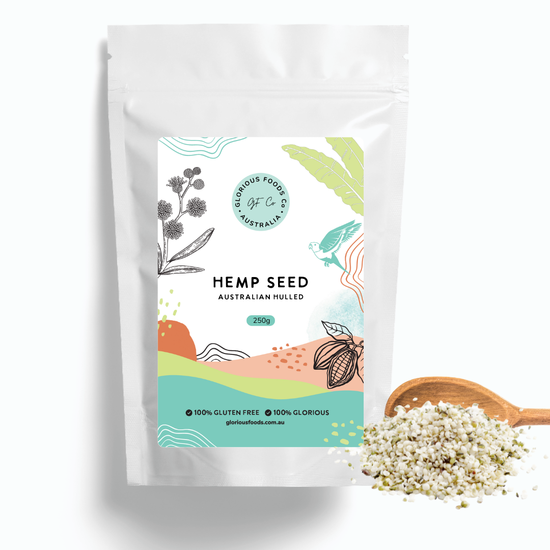 Hemp seed pack by Glorious Foods Co., 250g, Australian-grown, gluten-free, vegan, with scattered seeds on a spoon.