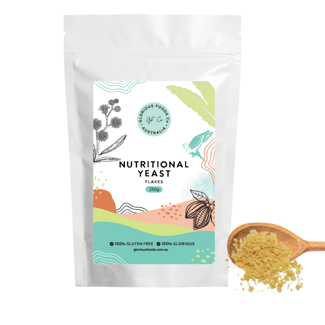 Nutritional Yeast Flakes package with spoon, gluten-free, vegan, B12 fortified.